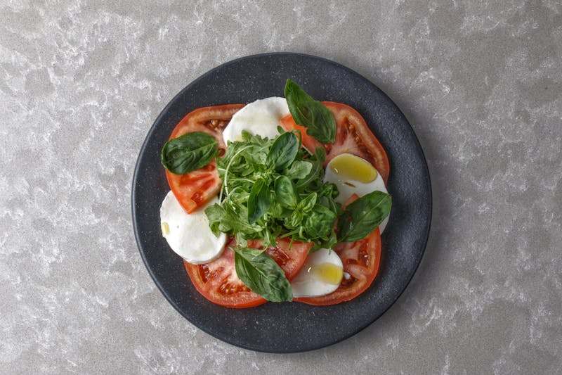 Veggie Garden punch pizza with seasonal vegetables and buffalo mozzarella