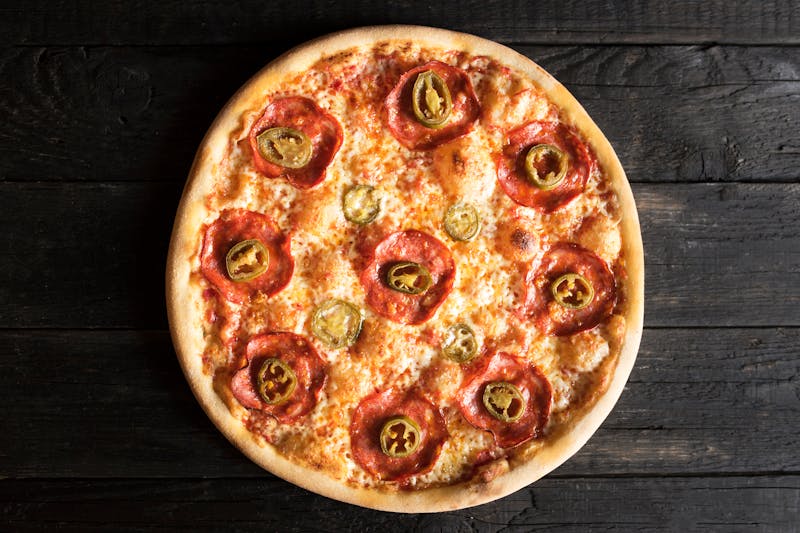 Classic Margherita punch pizza with fresh basil and mozzarella