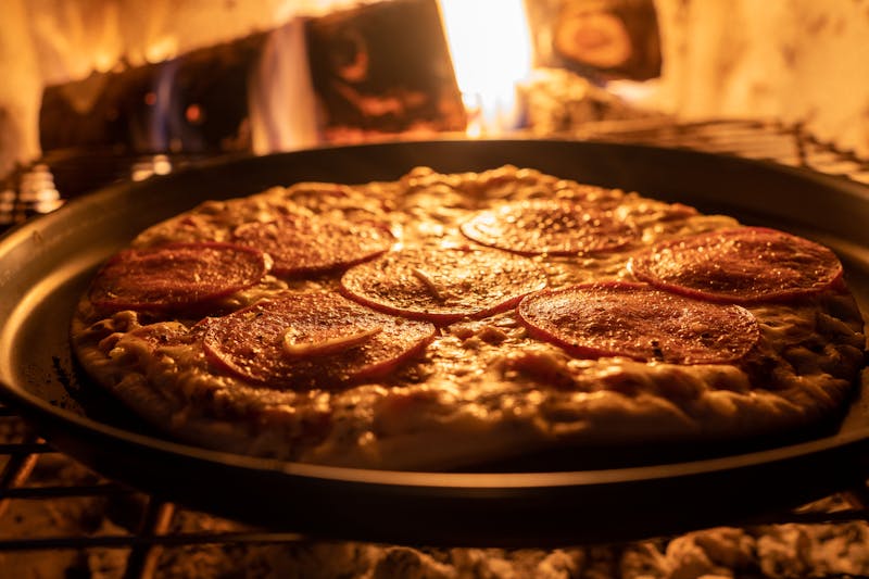Four cheese wood-fired pizza with mozzarella gorgonzola fontina and parmesan